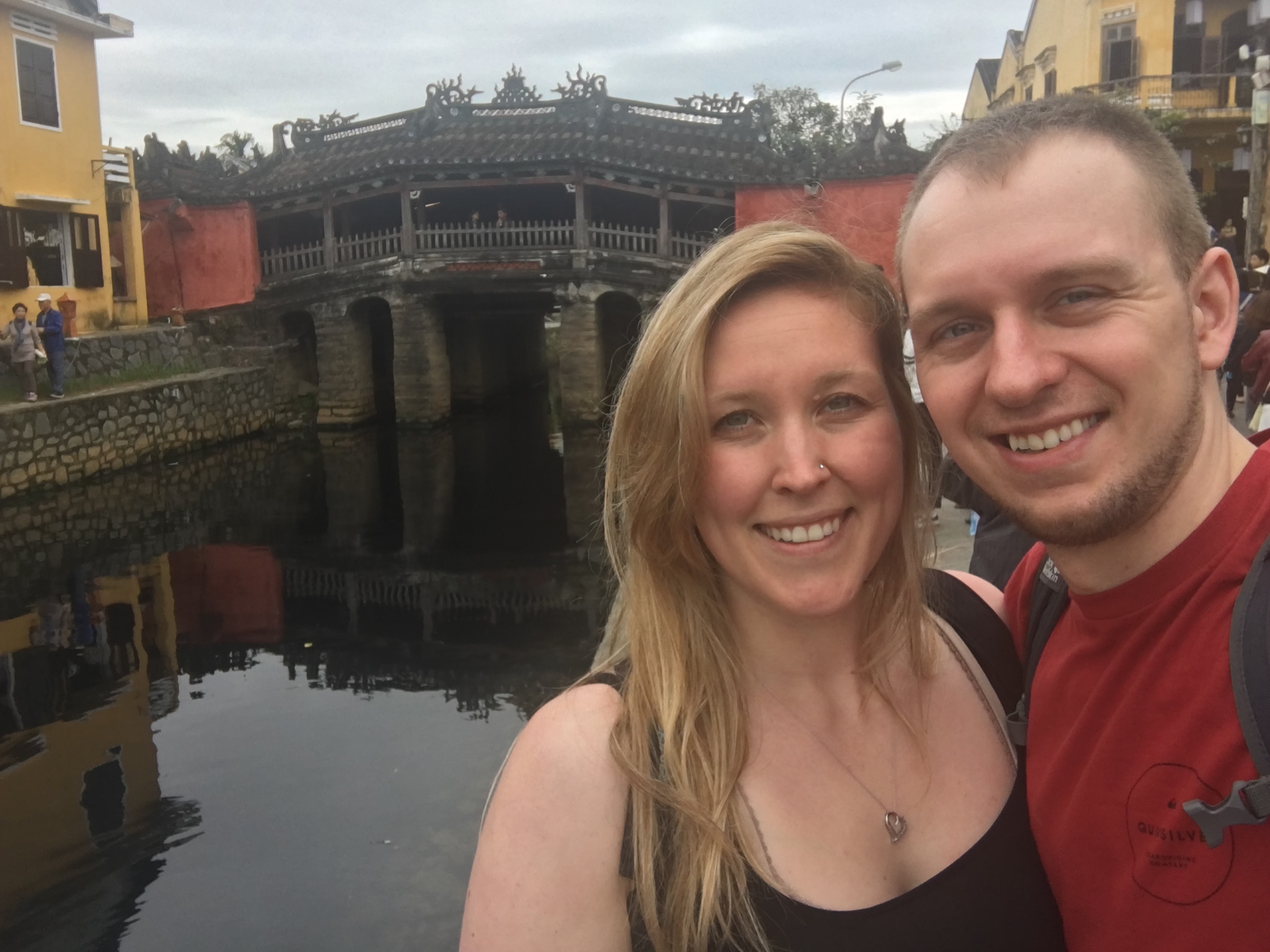 Erinn and Ben in front of the old Japanese Bridge in Hoi An Ancient Town, Vietnam.