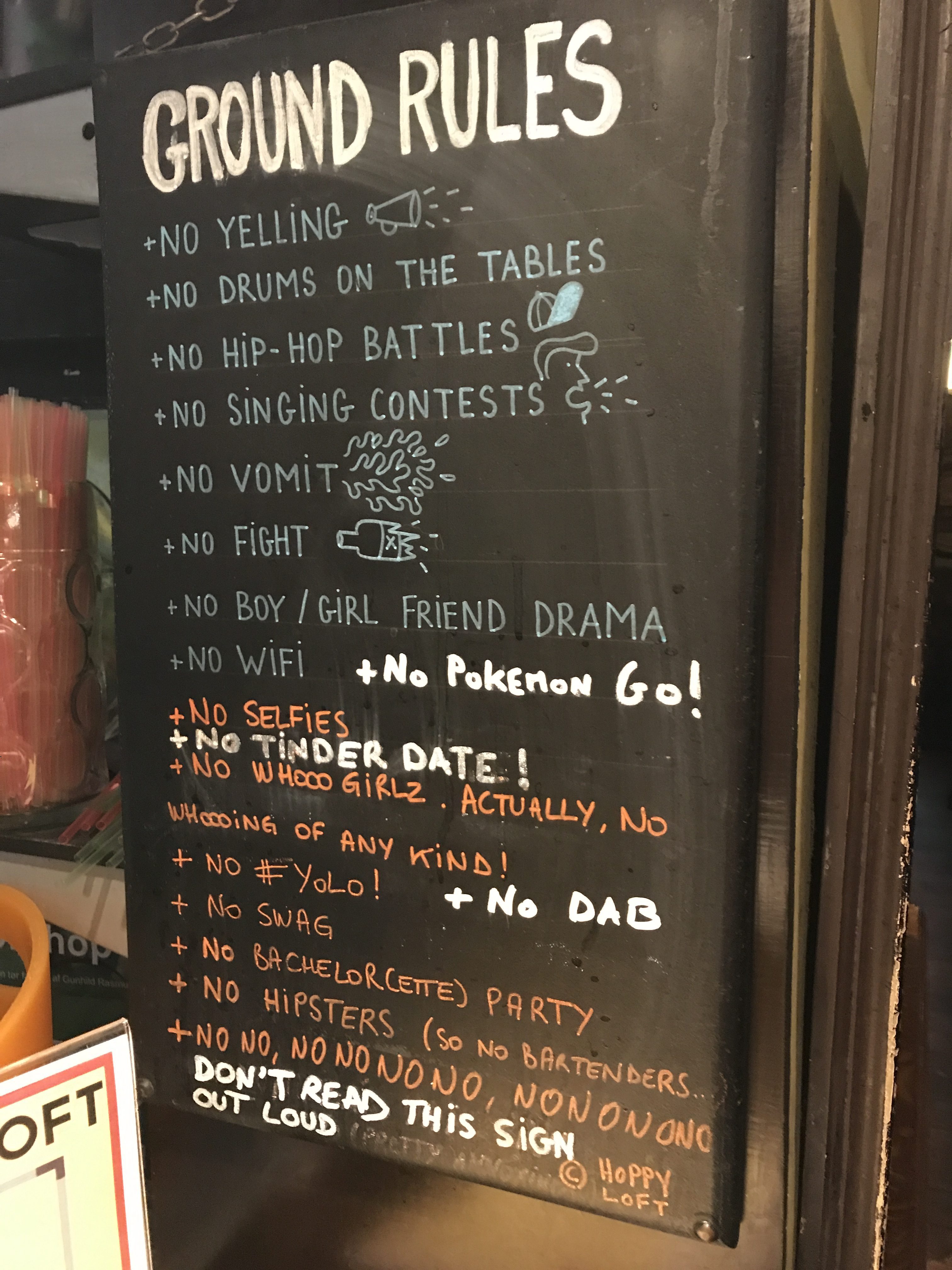 'Ground Rules' sign at the Delirium Cafe in Brussels, Belgium.