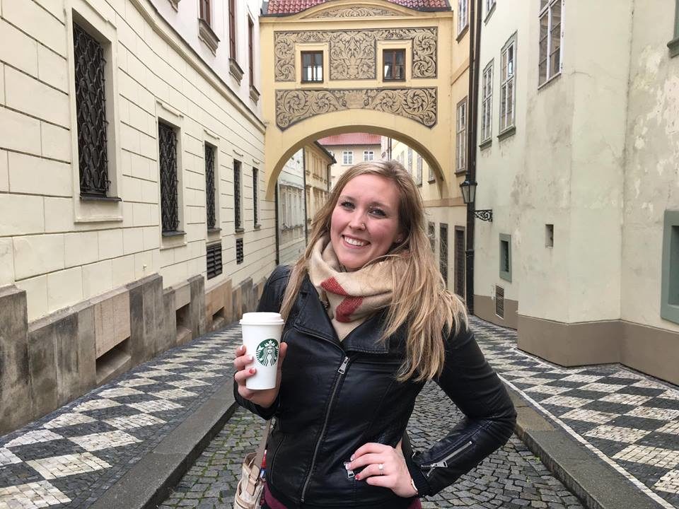 Erinn standing under an arch in Malá Strana