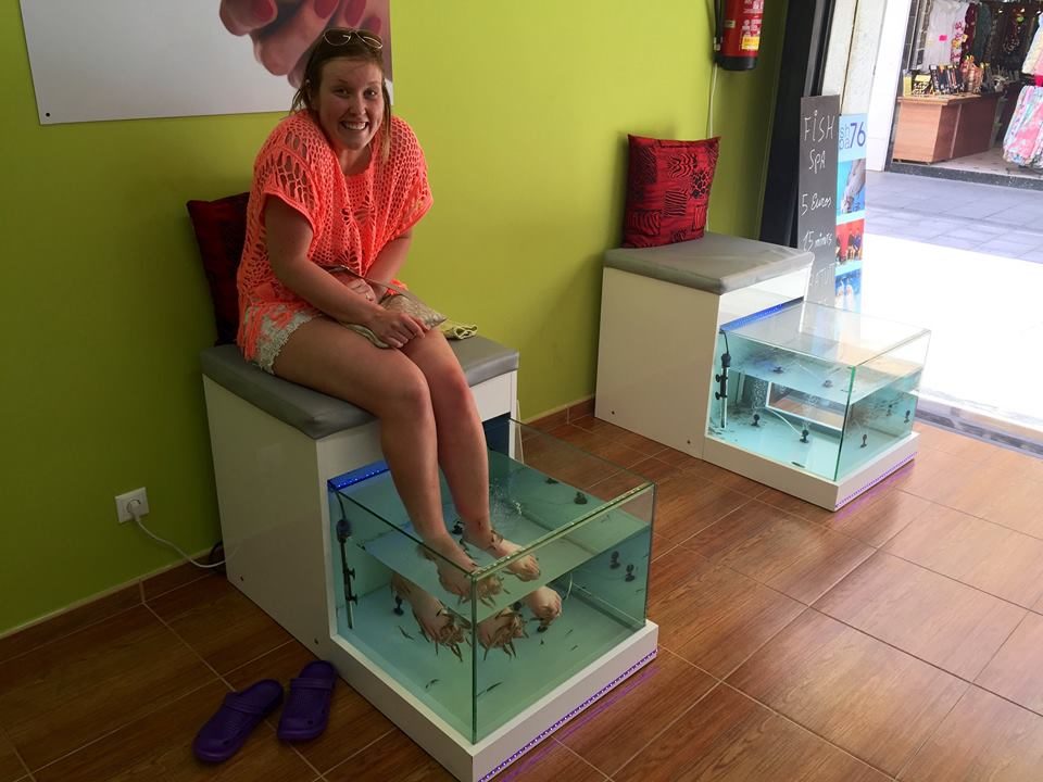 Erinn getting a fish pedicure in Santa Susanna.