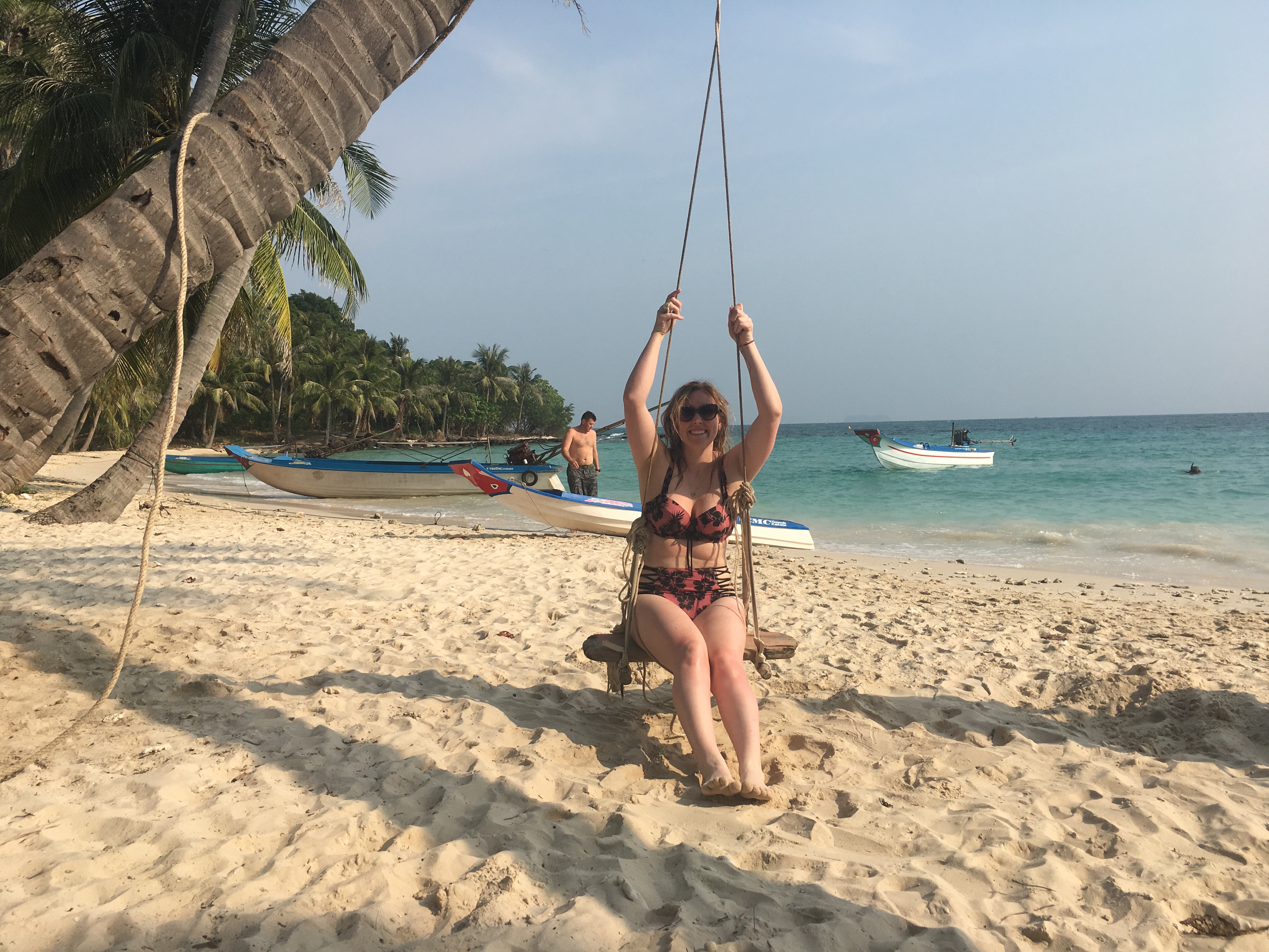 Erinn swings at the An Thoi islands of Phu Quoc, Vietnam.