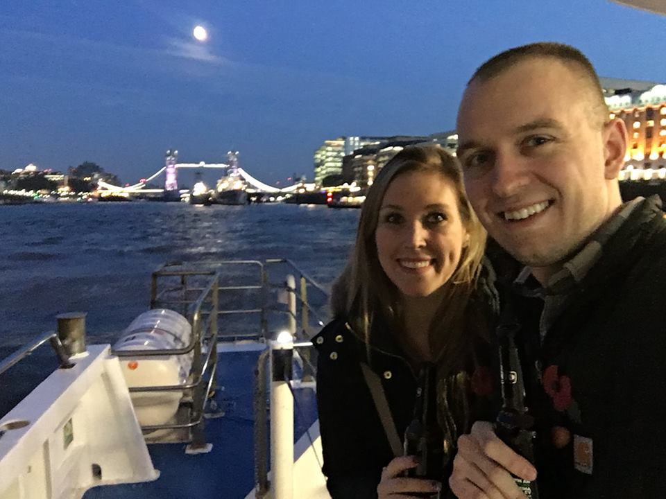 Erinn and Ben on a boat on the River Thames in London.