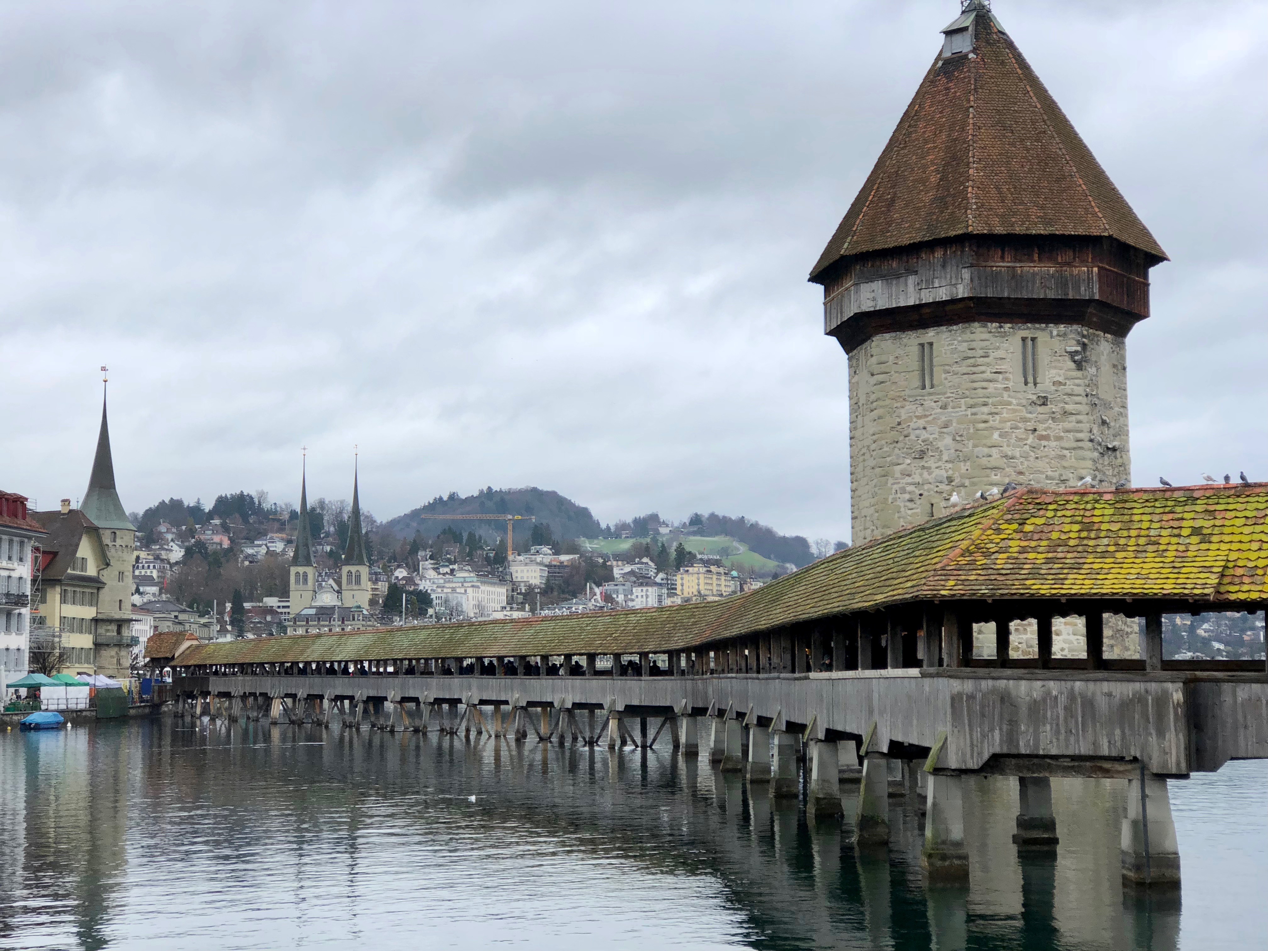 A picture of the Kapellbrücke, a wooden footbridge in Lucerne, Switzerland.