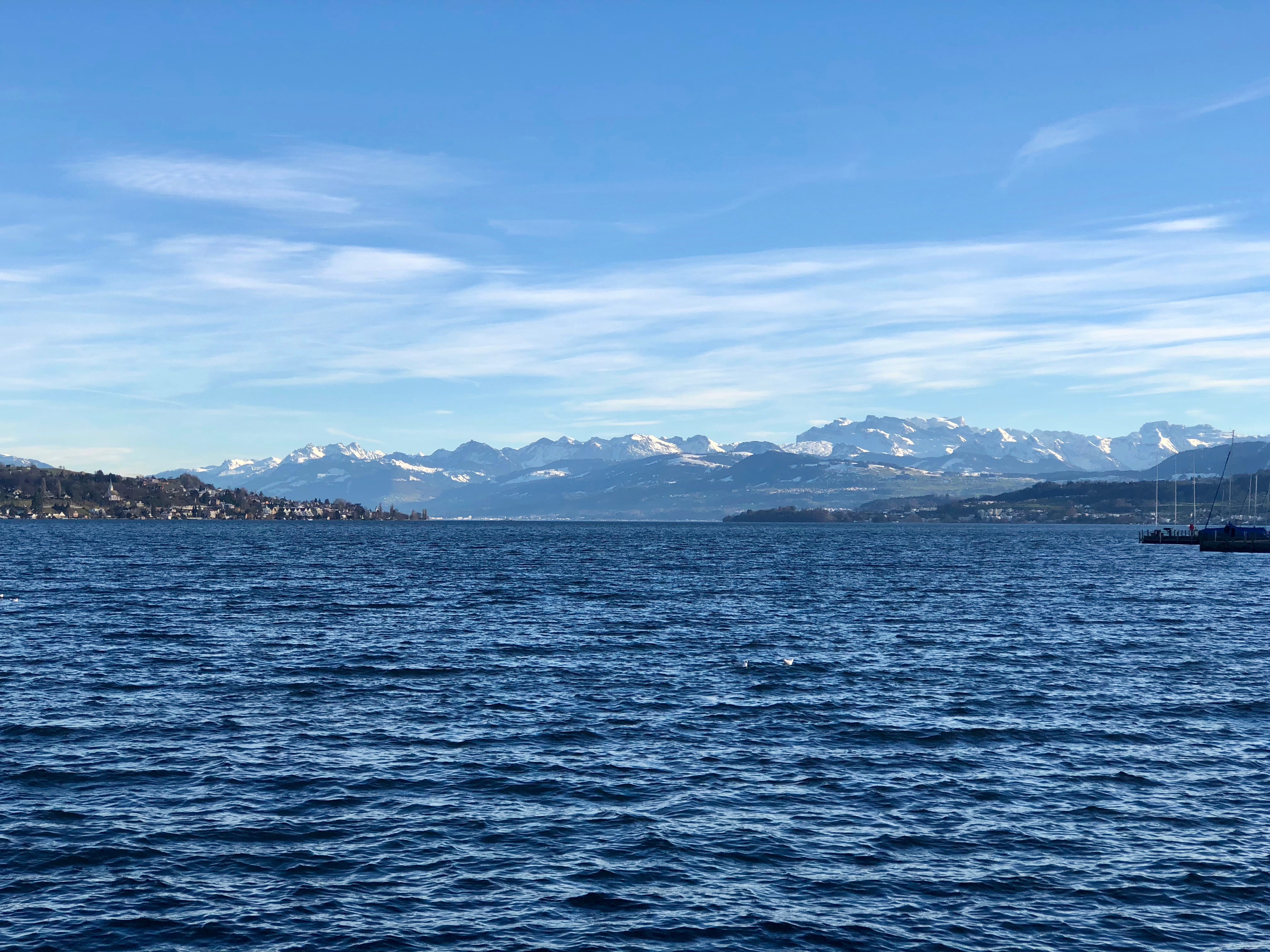 Views of the Alps from a boat cruise in Zurich, Switzerland.