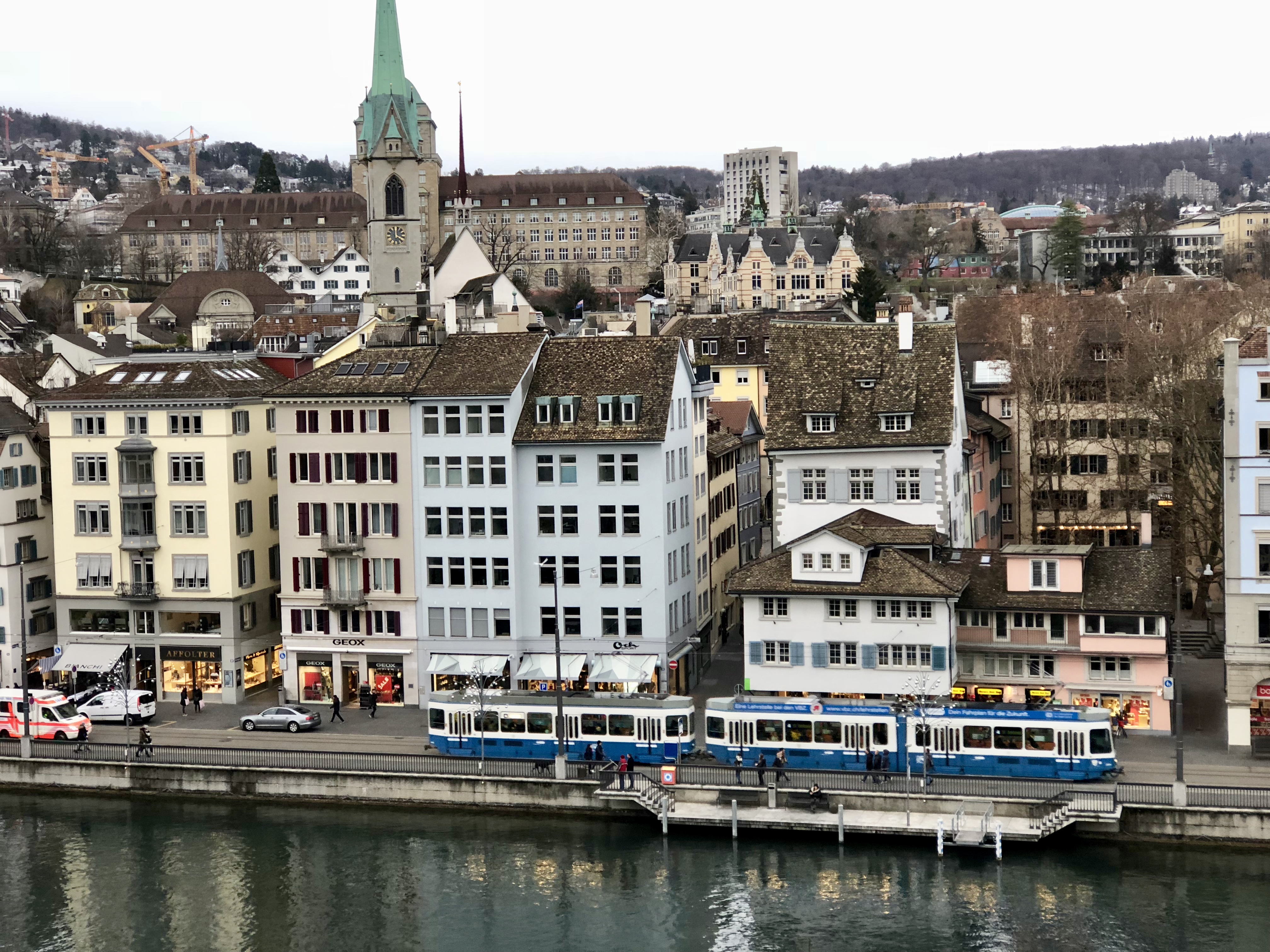 A view of buildings and a tram in Zurich, Switzerland.