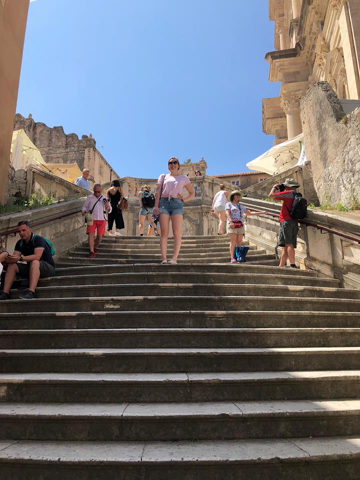 Erinn on the steps where Cersei did her infamous walk of shame through Kings Landing.