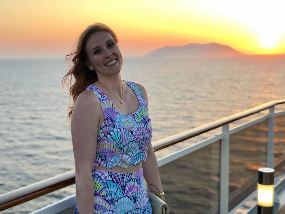 Erinn watching the sunset on board the MSC Poesia. 