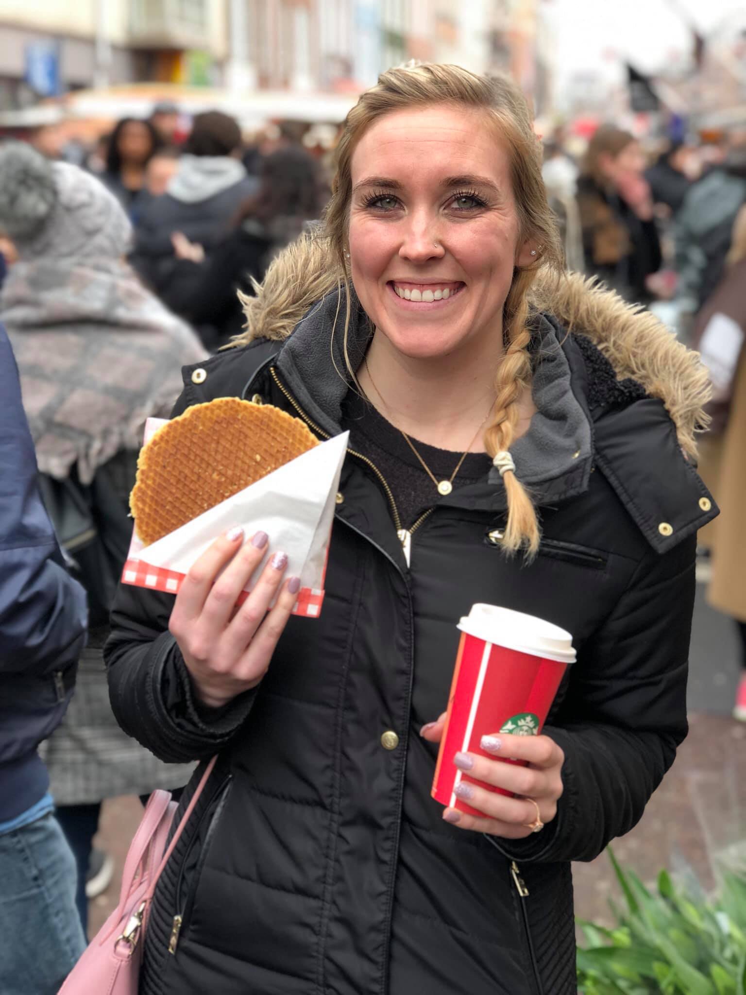 Erinn enjoying a Stroopwafel in Amsterdam