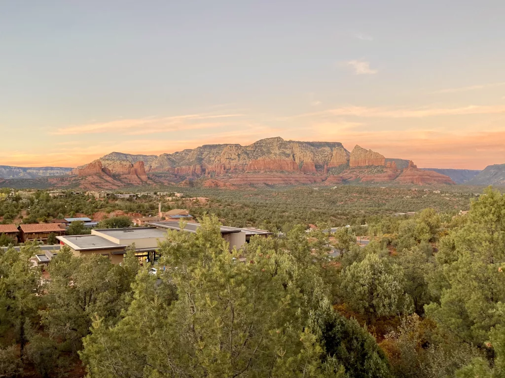 The view from the AirBnb balcony of beautiful red rock formations in Sedona.